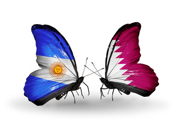 Two butterflies with flags Argentina and Qatar
