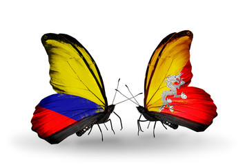 Two butterflies with flags Columbia and Bhutan
