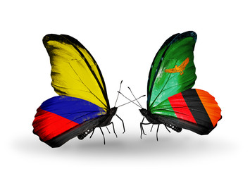 Two butterflies with flags Columbia and Zambia