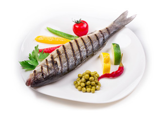 Grilled seabass on plate.