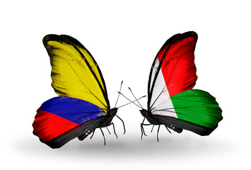 Two butterflies with flags Columbia and Madagascar