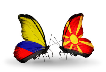 Two butterflies with flags Columbia and Macedonia