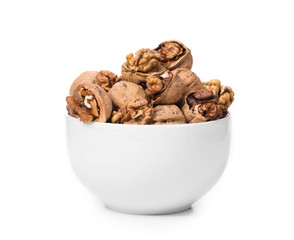 Close up of walnuts bunch in bowl.