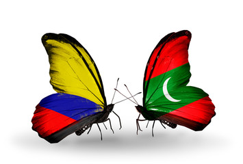 Two butterflies with flags Columbia and Maldives