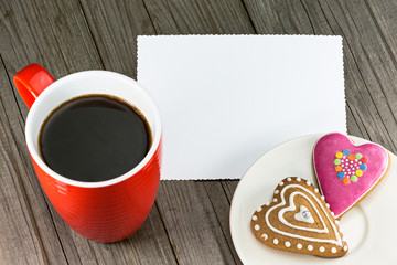 Cup of coffee and heart shape cookies