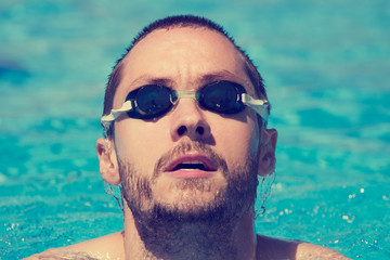 Fototapeta premium Slim sportsman swimming.