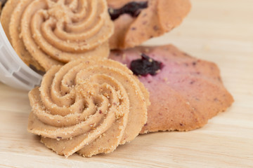 Cookies on wooden table background close up