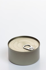 One grey metal can on white background.