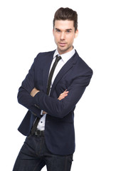 Portrait of a young business man with arms crossed