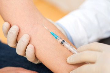 Obraz na płótnie Canvas Close up view of a arm vaccination