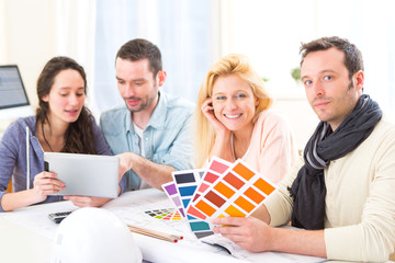 Architect students choosing colors for their project