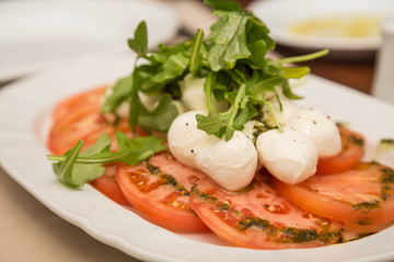 Tomatoes Mozzarella and Arugula