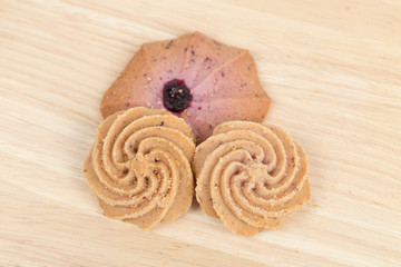 Cookies on wooden table background close up