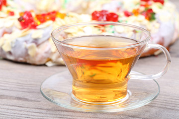 Tea cup and pretzel with jelly