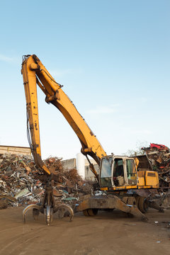 working equipment in recycling center
