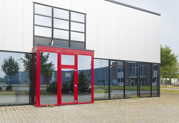 office building with red entrance