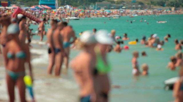 Crowd of people  at the summer beach vacation