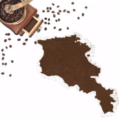 Coffee powder in the shape of Armenia and a coffee mill.(series)