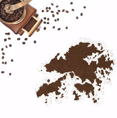 Coffee powder in the shape of Hong Kong and a coffee mill.(serie