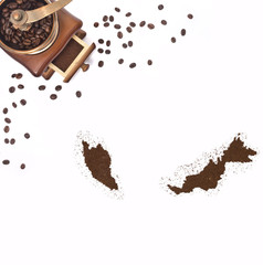 Coffee powder in the shape of Malaysia and a coffee mill.(series