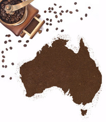 Coffee powder in the shape of Australia and a coffee mill.(serie