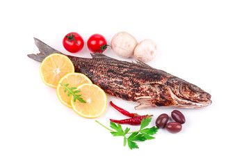 Grilled fish with vegetables.