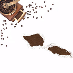 Coffee powder in the shape of Samoa and a coffee mill.(series)