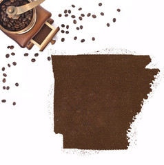 Coffee powder in the shape of Arkansas and a coffee mill.(series