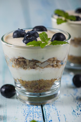 fresh blueberries with cream and mint