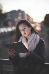 Fototapeta premium young beautiful long hair woman in town