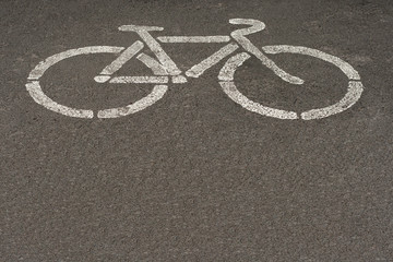 Asphalt road with bike sign.