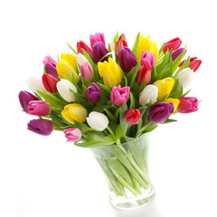 Pastel tulips in a glas vase