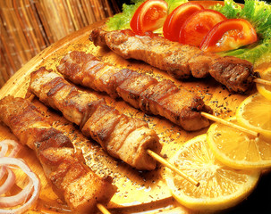 Souvlaki skewer served in traditional way.