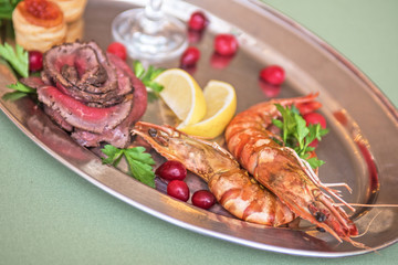 Grilled shrimps and beef meat