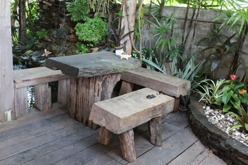 Stumps seats on wooden floor, Garden furniture