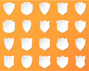 Shiny White Shields on a  Orange Background.