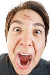 chubby kid or boy gesturing pain with sensitive tooth ache