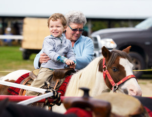 Happy Boy on a Pony Ride