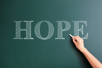 writing hope on blackboard