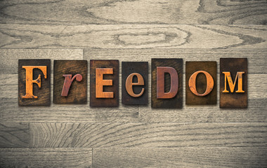 Naklejka premium Freedom Wooden Letterpress Concept