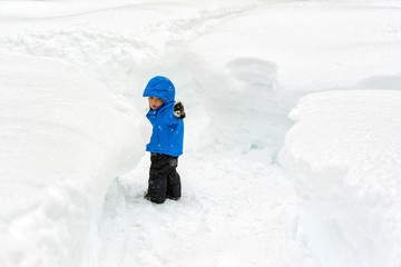 Boy in the Snow Tunnels