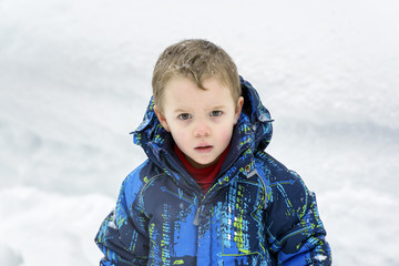 Young Boy with Snowflakes on his Hair