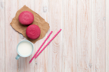 Cup of milk and macarons