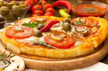 Fresh cheese, ham and pepperoni pizza