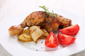 Chicken leg fried with vegetables