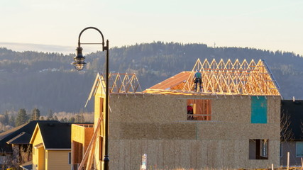 UHD time lapse movie of house construction roofing of a residential home in suburb of Happy Valley in Oregon 4k