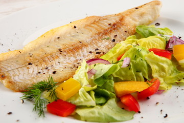 Fish with vegetables and potatoes