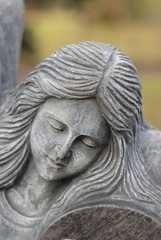 Engelsgesicht  auf Grabstein