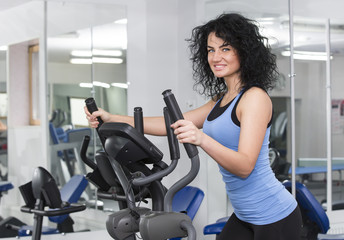 Fototapeta premium young girl in the gym for sports