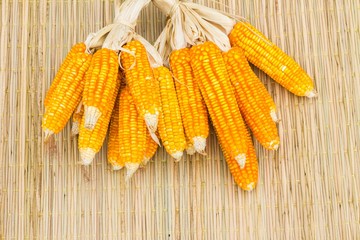 dry corn on thai traditional mat with copyspace